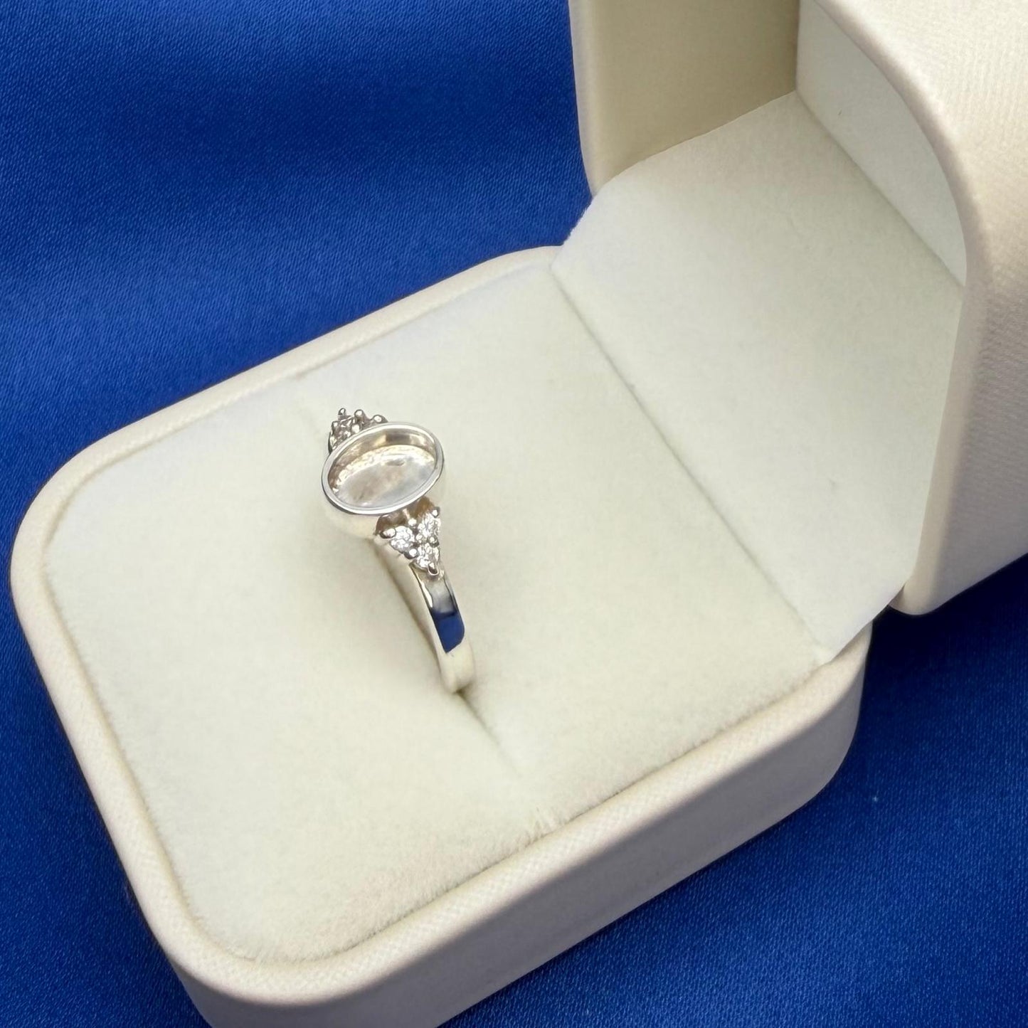 Oval Triple CZ Ring