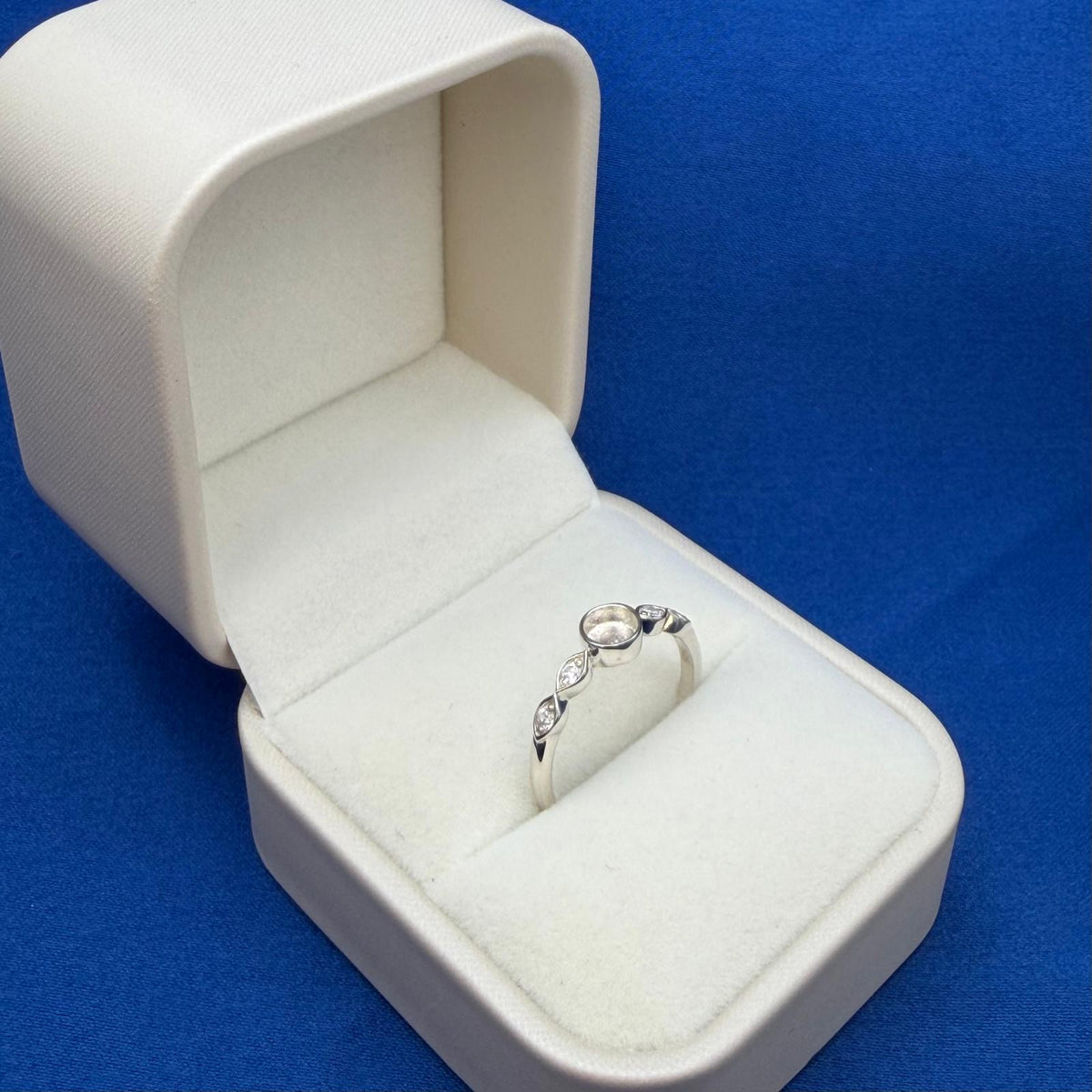 Quad Marquise CZ & Round Bezel Ring